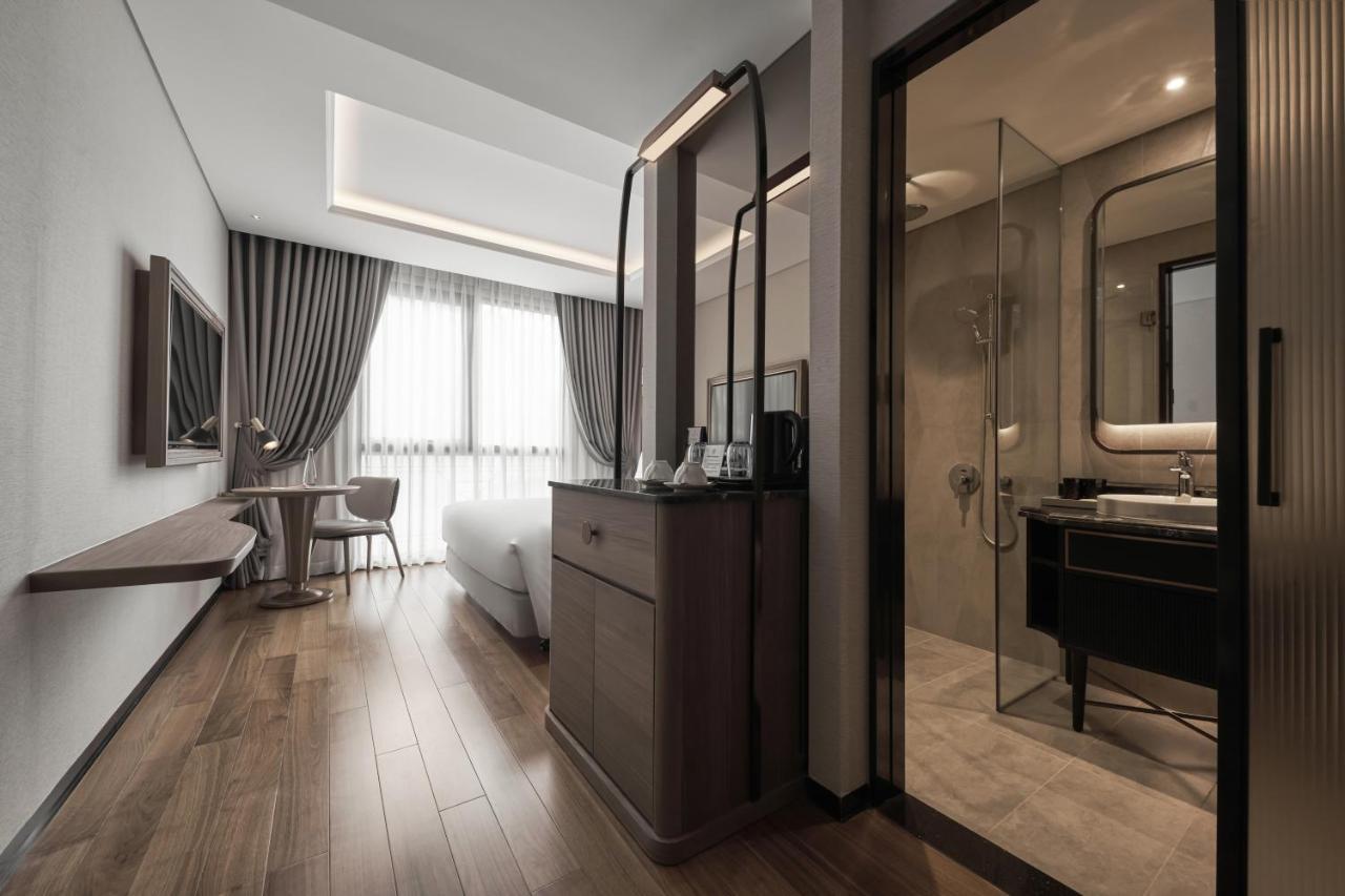 Hotel La Siesta Premium Saigon à Hô Chi Minh-Ville Extérieur photo A room at the hotel